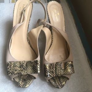 Kate spade genuine leather platform sandals with snakeskin bow.